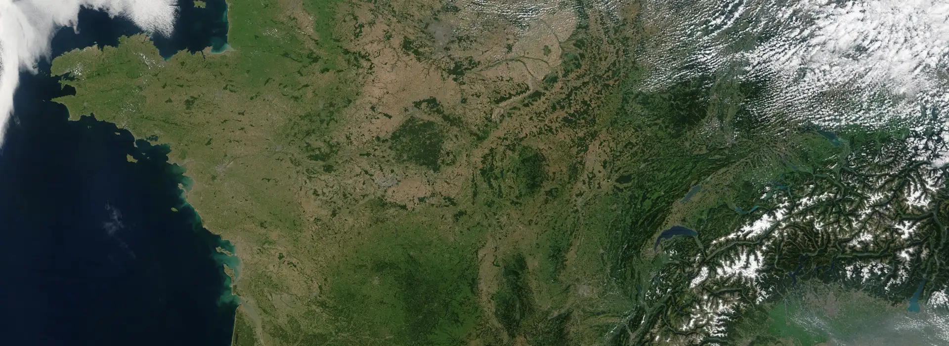 An example of forest geography. A satellite image of France in August 2002.